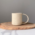 Load image into Gallery viewer, Carved Cream Speckle Mug
